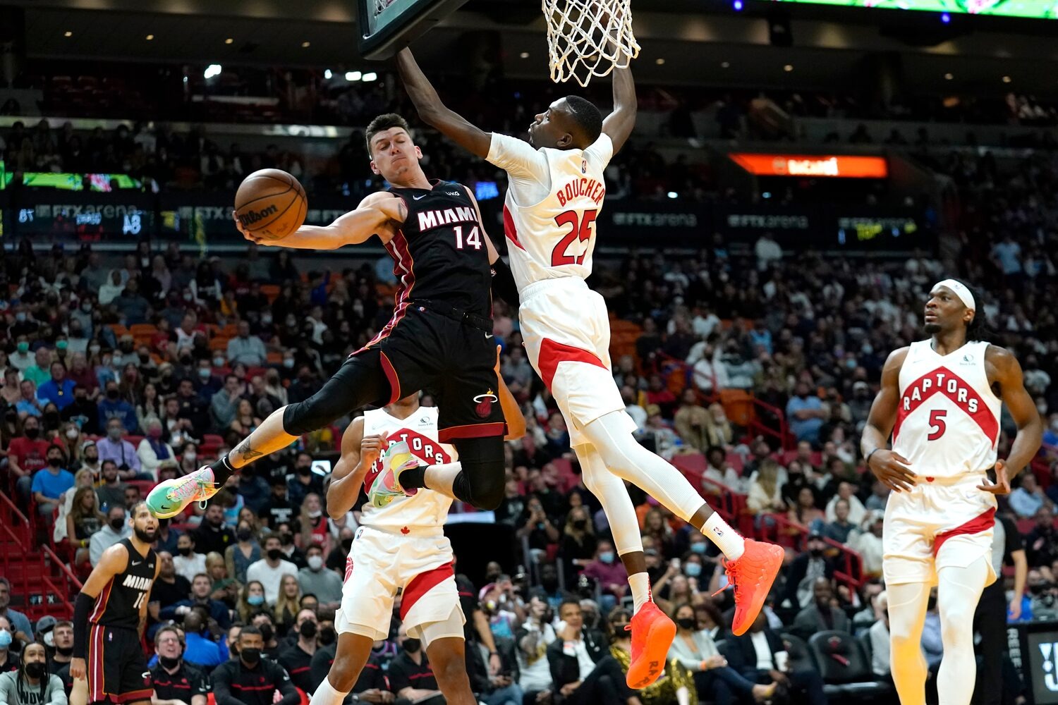 Butler Triple Double Helps Heat Hold off Raptors